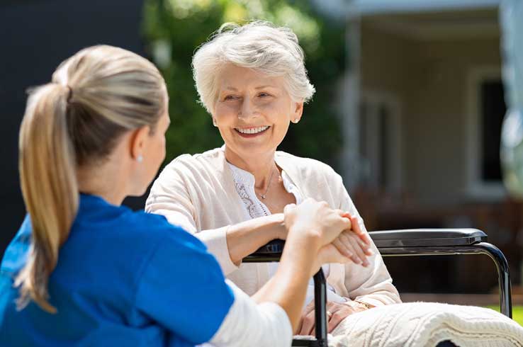 elderly lady with carer
