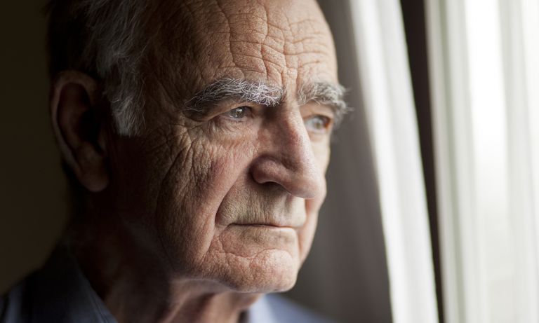 old-man-gazing-out-window